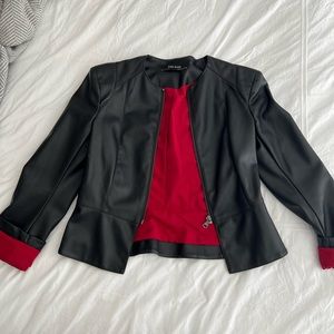 Faux leather cropped jacket. Zara. Red silk-like lining.